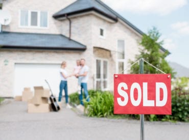 Happy family benefitting from strong york region real estate. York region real estate sales have been the strongest they've been in over 10 years. Find out how in this article.